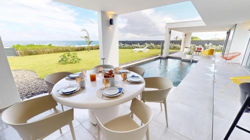 Palvelut, AQUAWAVES - Villa VAGUELIS 6 à 8 personnes - Front de Mer au Moule - vue Désirade & Surf (AQUAWAVES - Villa VAGUELIS 6 a 8 personnes - Front de Mer au Moule - vue Desirade & Surf) in Le Moule