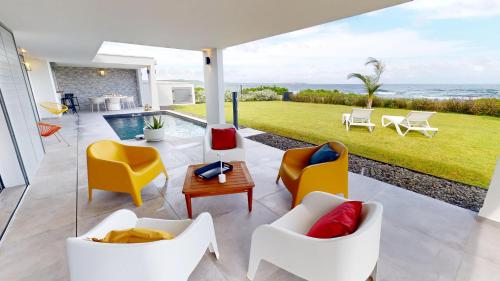 Palvelut, AQUAWAVES - Villa VAGUELIS 6 à 8 personnes - Front de Mer au Moule - vue Désirade & Surf (AQUAWAVES - Villa VAGUELIS 6 a 8 personnes - Front de Mer au Moule - vue Desirade & Surf) in Le Moule