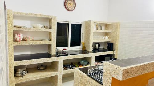 Konyha, Keur Tisserin in Sintian