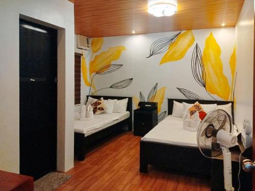 RedDoorz at Balai Malinawon Siargao