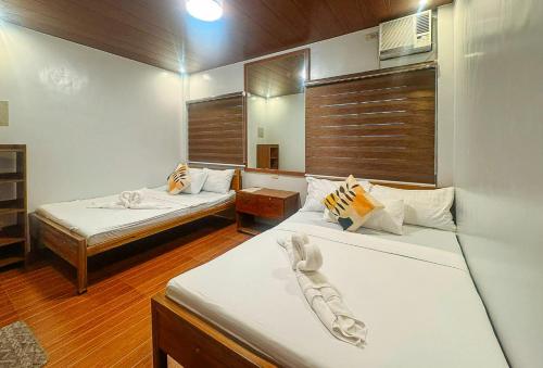 RedDoorz at Balai Malinawon Siargao Room Type - Deluxe Room