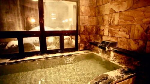 Baños termales, Hakuba Onsen Ryokan Shirouma-so in Hakuba