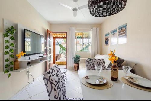 صالة مشتركة/ منطقة التلفزيون, Casa de praia Unamar Cabo frio piscina churrasqueira in Unamar