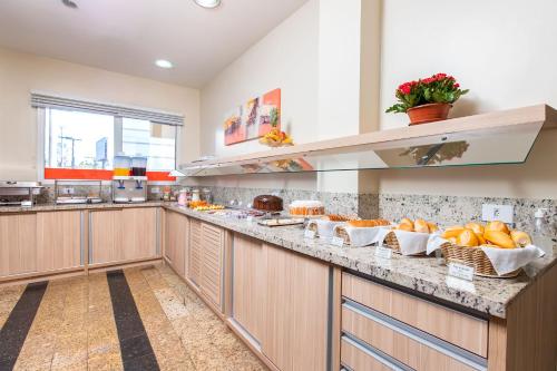 Hotel Express Canoas - Tap to explore photos