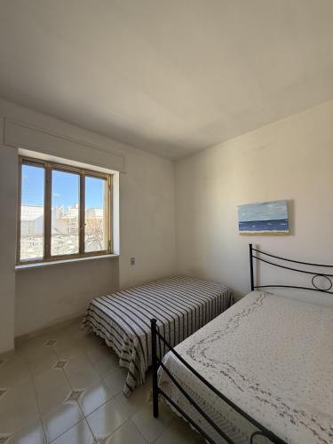 Casa vacanza Ninetta a Torre Lapillo con cortile