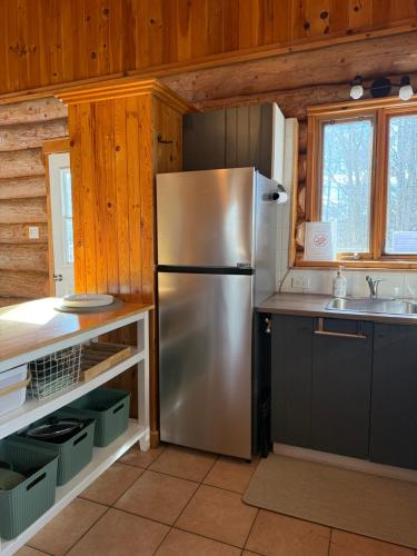 Le Rondin, Chalet en bois rond avec spa in Saint-Gabriel-de-Valcartier (QC)