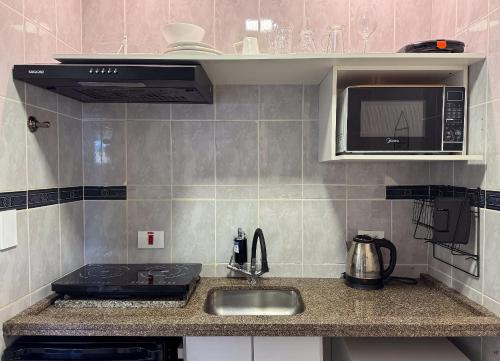 廚房, Studio com Ar e Vista Verde • 600m Parque Barigui in 庫里奇巴郊區