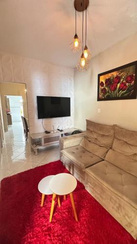 Koplietošanas atpūtas telpa ar TV, Casa espaçosa, 03 Quartos, Área Gourmet, Garagem (Casa espacosa, 03 Quartos, Area Gourmet, Garagem) in Baixo Guandu