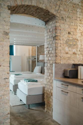 SC 00 LOFT by ROCKCHAIR Apartments l SUPERHOST Status l Unique & Style Loft 230 sqm 2 Floors Tablefootball Tabletennis 3 Bathrooms Boxspringbeds welcomes you!, Berlín (fotografie 8)