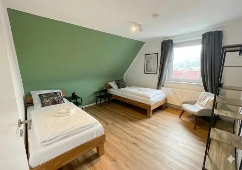 Großes Apartment,Ferienwohnung Mut 90 qm2, großer Aufenthaltsbereich für Firmen, Gruppen, Familien, Nahe Ulm, 3 Schlafzimmer, WLAN,Hotel-TV,Einzelbetten,Garten,ruhige Lage,Bettwäsche,Handtücher inklusive,Self Check-in,Nahe BWK,Uni,Legoland in Blaustein, Deutschland