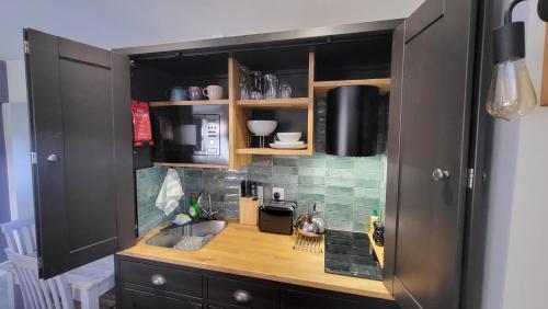 virtuve, Gardeners Cottage Apartment in Bleikmīra