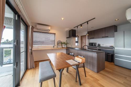 Kitchen, LAGUNA OKINAWA Beachfront YAKA in Kin