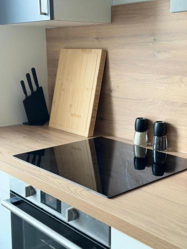 Kitchen, L'Ecrin Parisien - T3 Design - Le Bourget - CDG in Le Bourget