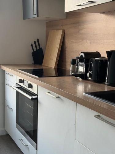 Kitchen, L'Ecrin Parisien - T3 Design - Le Bourget - CDG in Le Bourget