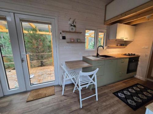 Oaza Święty Spokój - Tiny House z Balią i Jacuzzi przy rzece Narew (Oaza Swiety Spokoj - Tiny House z Balia i Jacuzzi przy rzece Narew) in Szelkow