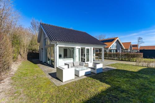 Zonnedorp 4 Villa Jula Renesse | Comfortabele strandvilla voor 6 Personen in Oude Moolweg en Laone