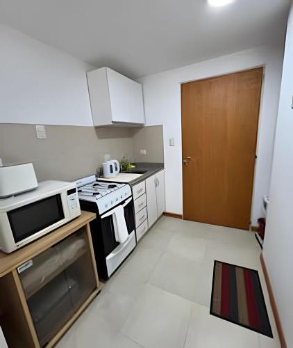 Kitchen, Pichincha 1 | calido | Monoambiente in Alberto Olmedo