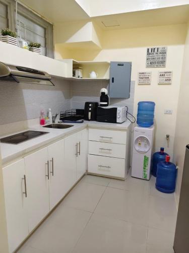 Kitchen, Pico hamilo coast condotel suite in Catandaan