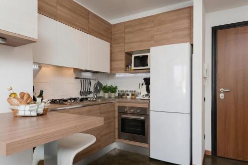 virtuve, Appartamento Gassman - Holiday Apartment in Milano in Quartiere Adriano