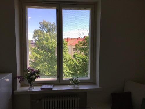 Cozy, quiet, top floor in Töölö