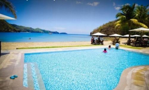 Beach, Pico hamilo coast condotel suite in Catandaan