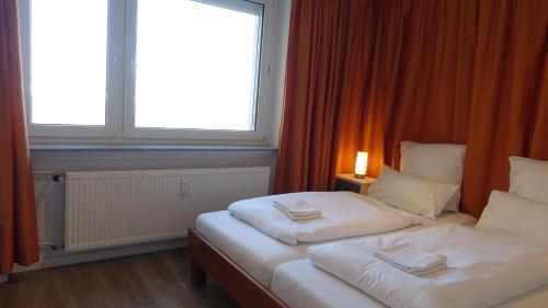 3 Zimmer Wohnung, Netflix, Balkon, Skyline Blick – khách sạn tại Eschborn