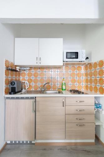 Konyha, Modern Apartment • Main Square • 30 m² • Comfort in Leoben