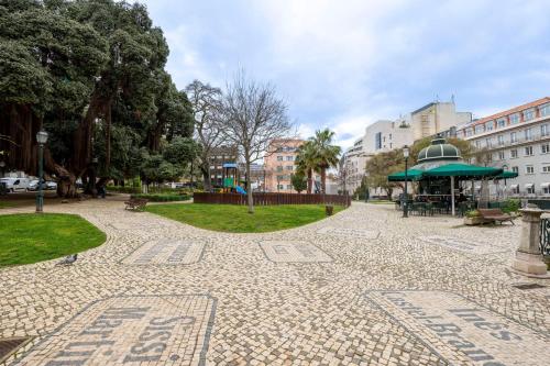 Cozy 3BR Near Av Liberdade Sleeps 8 Patio - image 4