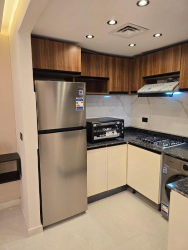 Hotel-quality apartment for rent in 6th of October - image 6