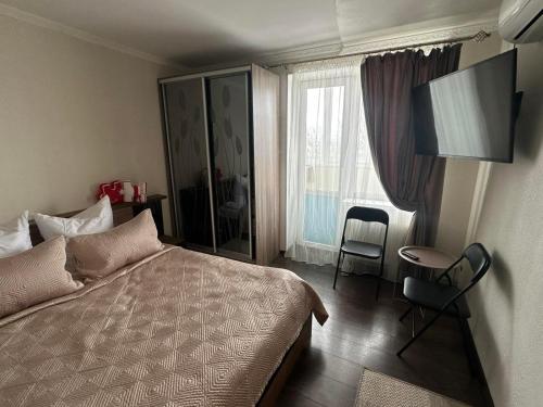 Koplietošanas atpūtas telpa ar TV, Apartment in Zolotonoša