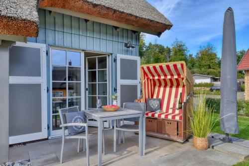 Ferienhaus Boddenlust 24 Feriendorf Klein Stresow Rügen by ruyastay in Putbus, Deutschland
