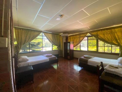 GRAND SELVA LODGE  TOURS in เตนา