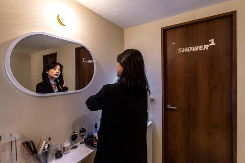 Shared lounge/TV area, CrashinYongsan guest house near Blue Tile Charcoal Fire Ribs
