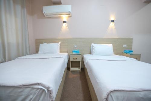 1 doppelbett oder 2 einzelbetten, stadtblick
