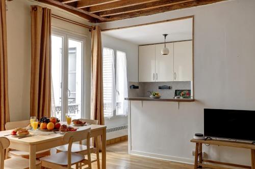 Serenty - 1BR Eiffel Tower & Rue Cler - image 11