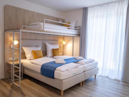 Fairschlafen Boutique Hostel mit Hotelkomfort - Kapitänszimmer 1-03 in Neustadt in Holstein, Deutschland