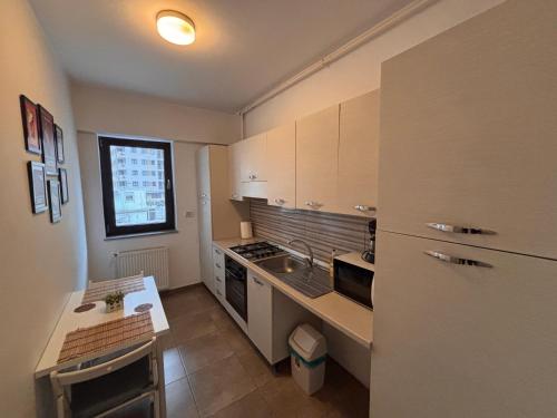 Bellagio - Cozy Apartment with Free Parking & Gym, Bucarest (foto 4)