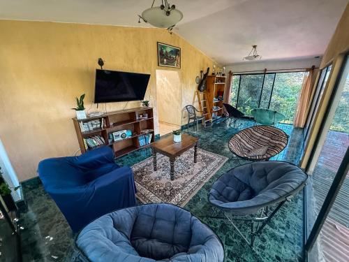 Közös társalgó / TV, Hotel del Bosque in Guatemala