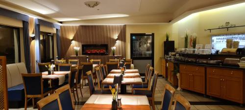 餐廳, KomfortHotel Grossbeeren - Stadt-Gut-Hotel in 大貝倫