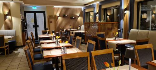 餐廳, KomfortHotel Grossbeeren - Stadt-Gut-Hotel in 大貝倫