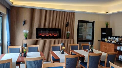 餐廳, KomfortHotel Grossbeeren - Stadt-Gut-Hotel in 大貝倫