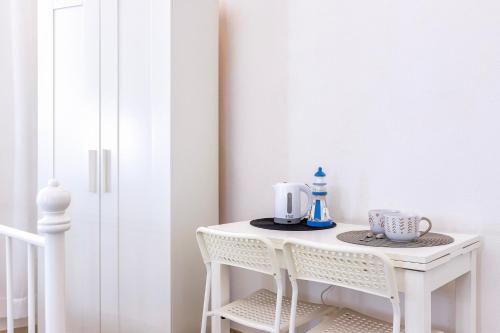White shell rooms self check-in in Alghero