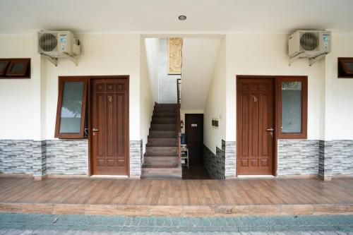 Urbanview Hotel Syariah Griya Asri Patran near Tugu Station – Sleman, MN