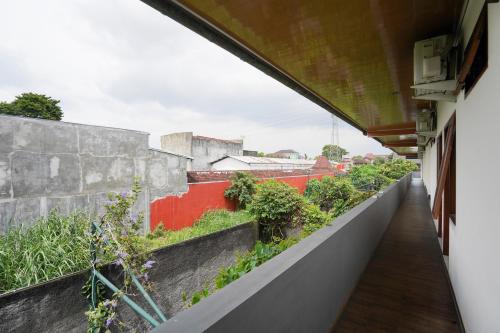 Urbanview Hotel Syariah Griya Asri Patran near Tugu Station – Sleman, MN