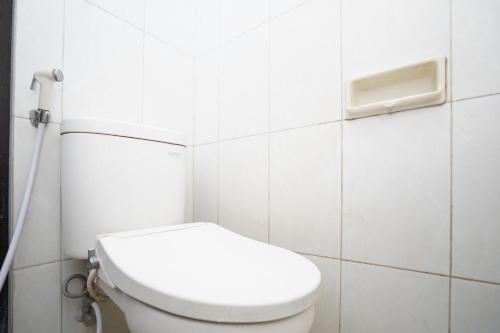 Urbanview Hotel Syariah Griya Asri Patran near Tugu Station – Sleman, MN