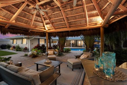 Tropical Tiki - Outdoor Oasis Tiki Hut Pool by Anna Maria Life Vacation Rentals - image 2