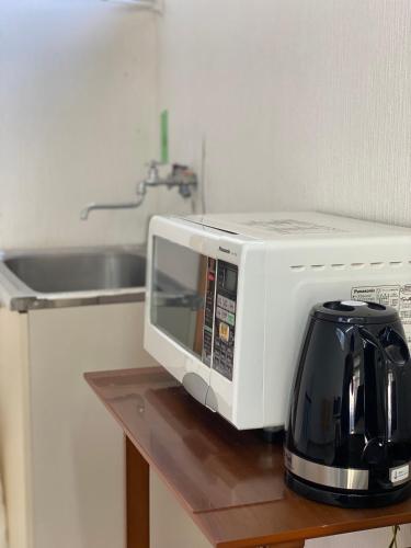 Facilities, SUBAKO 1日1組限定の宿とcommunity space in Yurihonjo