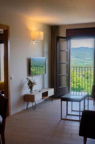 Apartamentos con encanto entre naturaleza, rutas y bodegas - Casa Albañil (Casa albanil, aptos en la Ribagorza, arte, ciclismo, naturaleza y enoturismo, entre Graus y Torreciu) in La Puebla De Castro