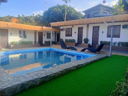 Swimming pool, V Hostel Galera - Quad Room in Puerto Galera