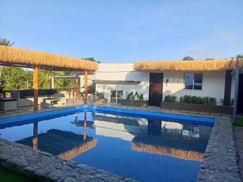 Swimming pool, V Hostel Galera - Quad Room in Puerto Galera